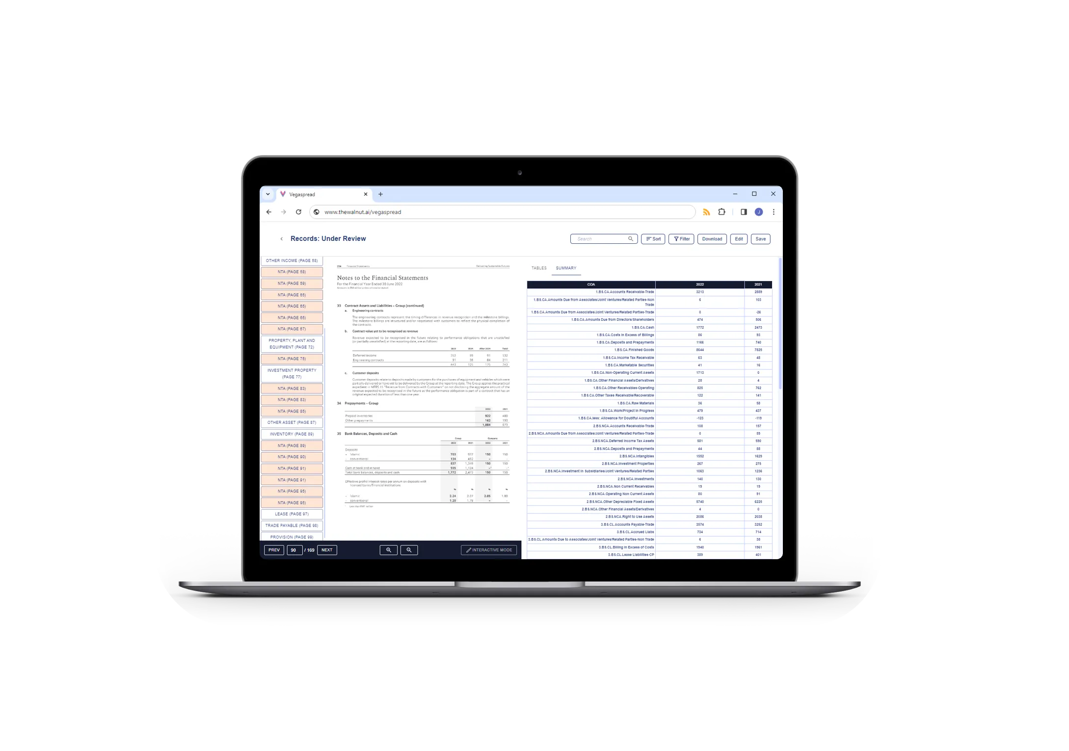 Vega financial spreading platform shown on a laptop
